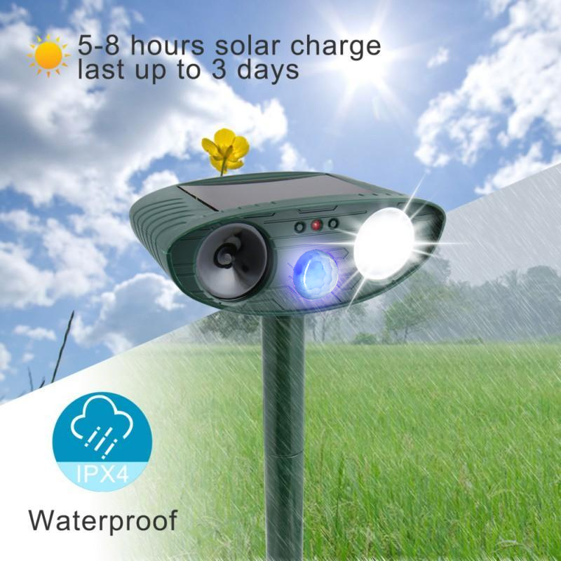 Detail shot of the solar panel on the ultrasonic animal repeller, ensuring continuous outdoor garden protection.