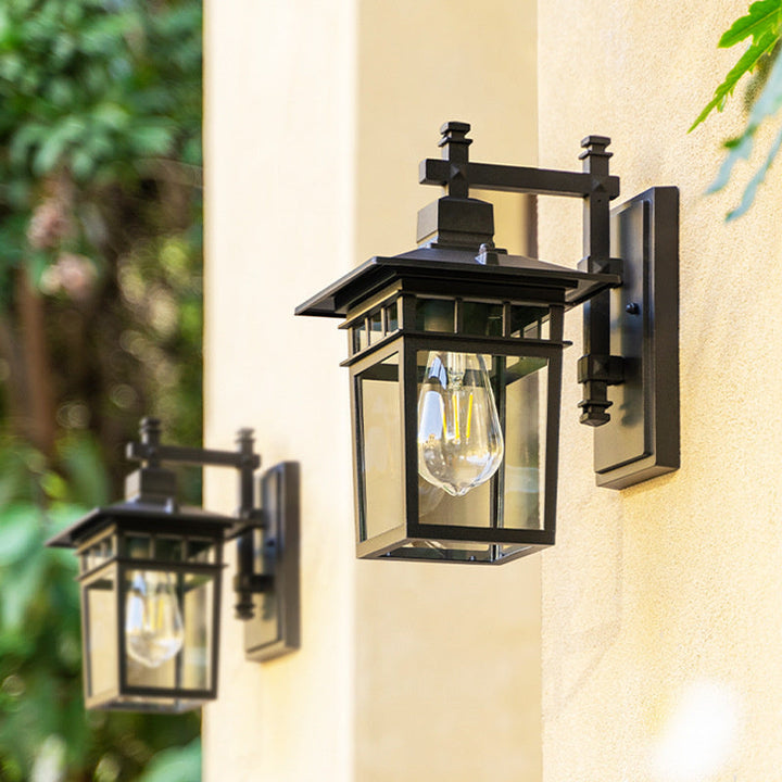 Black waterproof outdoor wall lantern, aluminum & glass, for garden, porch, patio exterior lighting.
