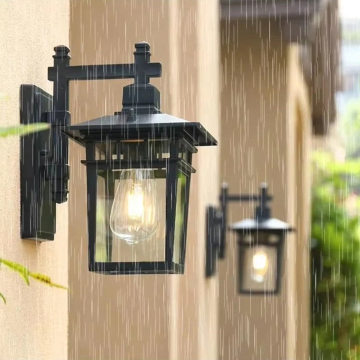 Exterior waterproof wall lantern, black, aluminum & glass, ideal for garden, porch, patio lighting.
