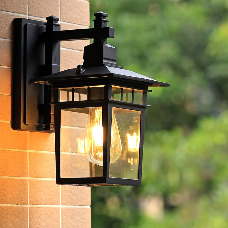 Sleek black aluminum outdoor wall light, waterproof lantern design for patio & home exterior.