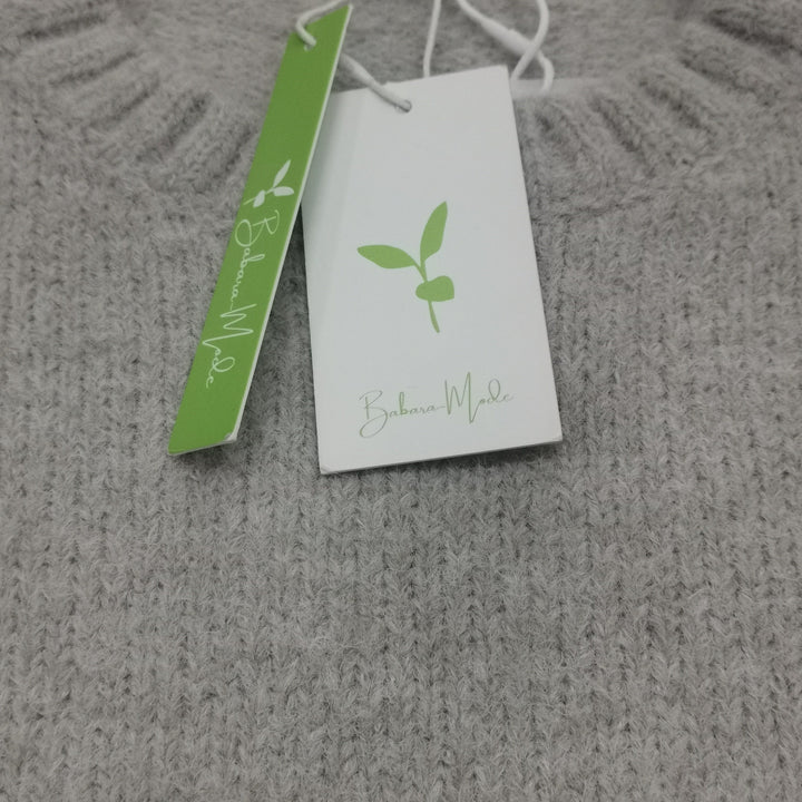 Cozy women's oversized sweater, soft knit fabric for ultimate fall fashion and casual style.