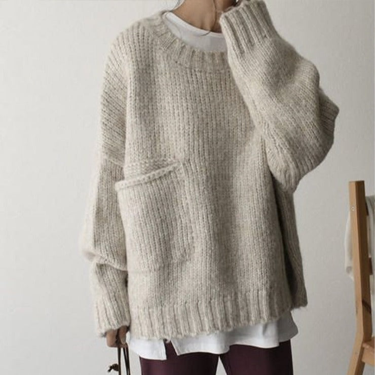 Elegant yet casual women's oversized sweater, soft knit for fall essential warmth & relaxed style.