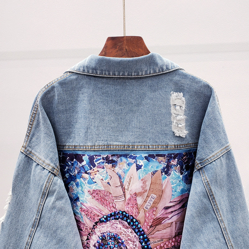 Trendy women's oversized denim jacket, relaxed fit, light blue wash. Ideal casual outerwear for fall & spring fashion.
