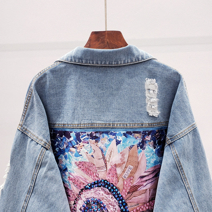 Trendy women's oversized denim jacket, relaxed fit, light blue wash. Ideal casual outerwear for fall & spring fashion.