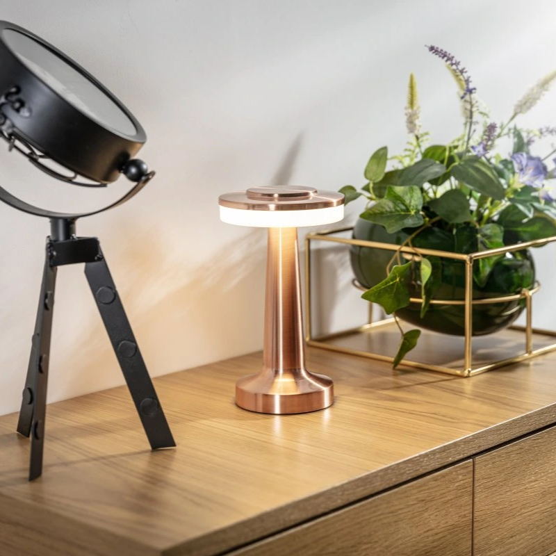 Dimmable rechargeable LED table lamp, retro style. Portable and perfect for cozy ambient lighting.