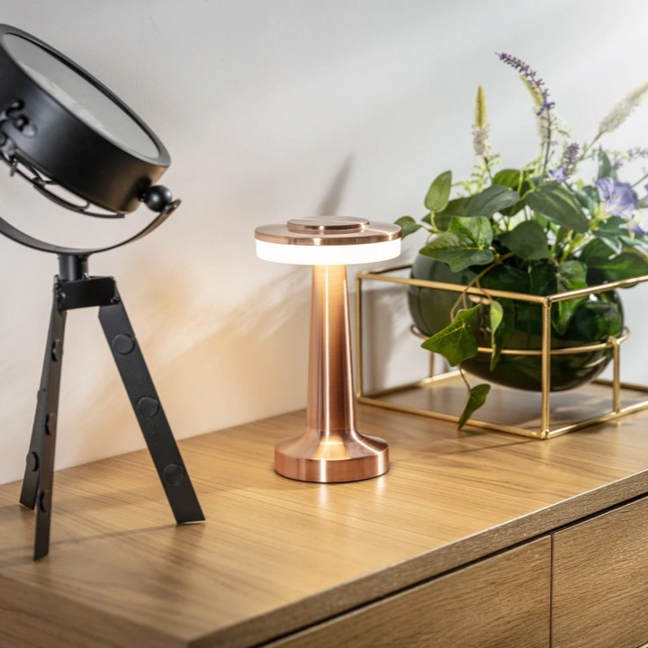 Dimmable rechargeable LED table lamp, retro style. Portable and perfect for cozy ambient lighting.