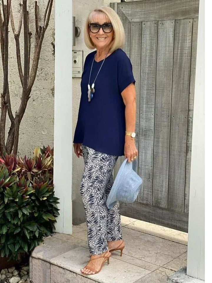 Stylish women's wide-leg printed pants from a two-piece set, ideal for coastal chic summer fashion.
