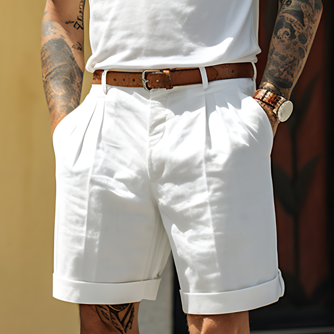 Men's refined tailored pleated shorts for a smart casual summer look.