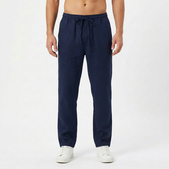 Navy blue men's summer linen pants, straight-leg with drawstring, offering breathable casual style.