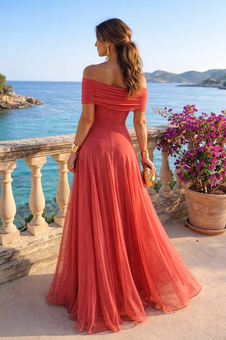 Stylish women's off-shoulder maxi cocktail dress in a luxurious fabric. Ideal formal dress for evening events.