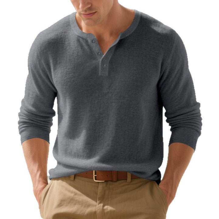 Stylish men's long sleeve Henley shirt, featuring a button placket and relaxed fit for casual everyday fashion.
