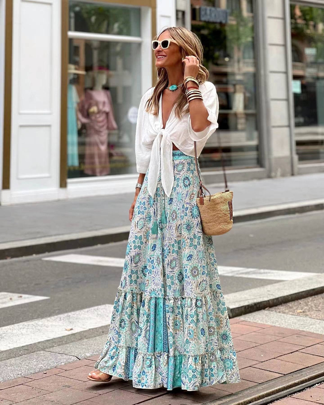 Elegant women's floral A-line midi dress with flowing silhouette, perfect for autumn casual wear.