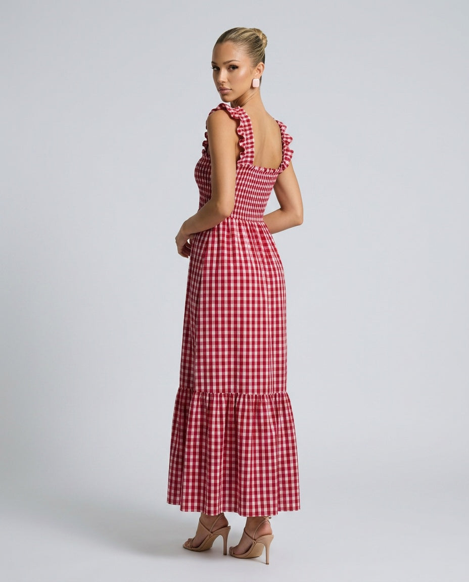 Woman in beige gingham maxi dress, ruffle strap & smocked bodice. Breezy casual summer look.