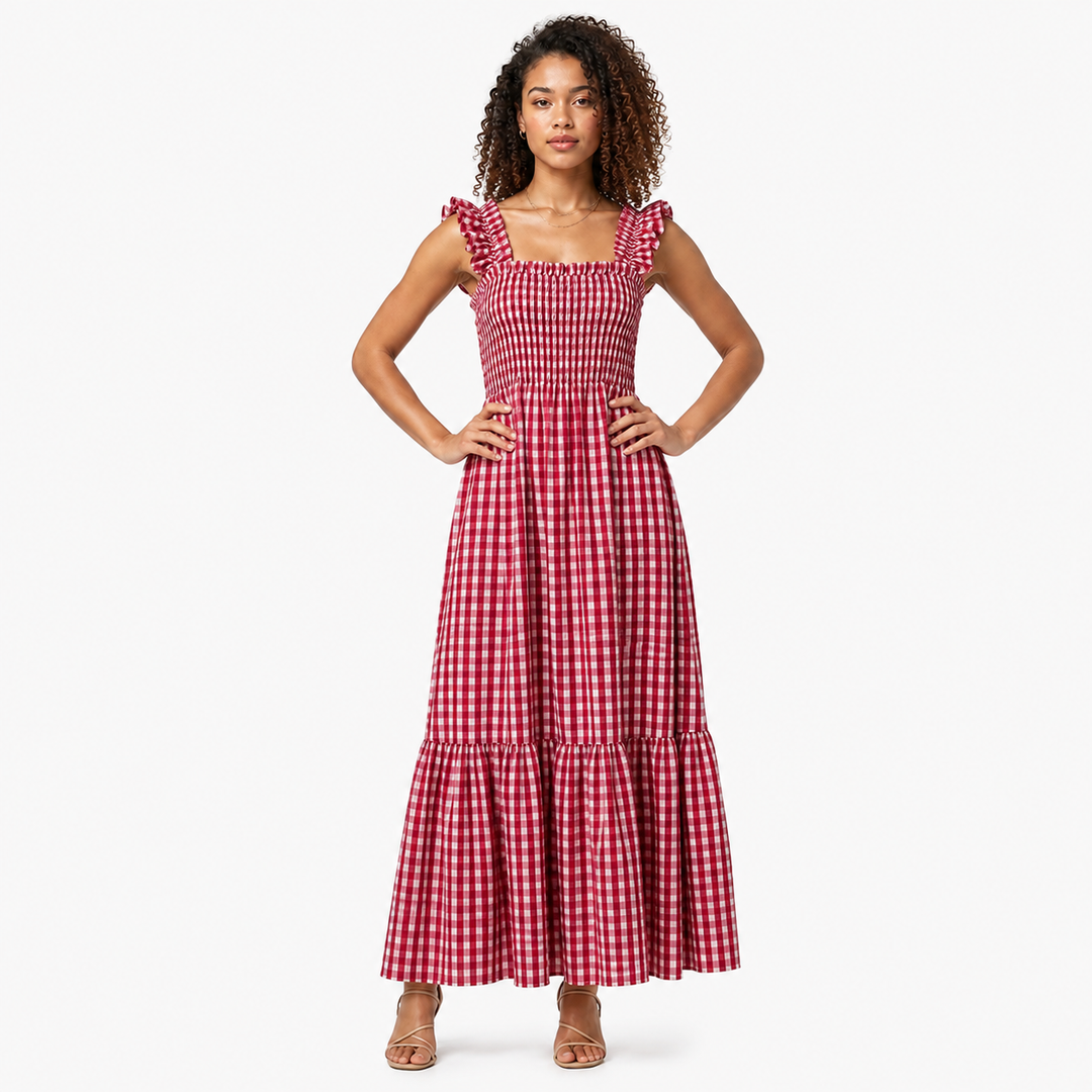 Woman in black gingham maxi dress, elegant ruffle strap & smocked bodice. Perfect summer day dress.