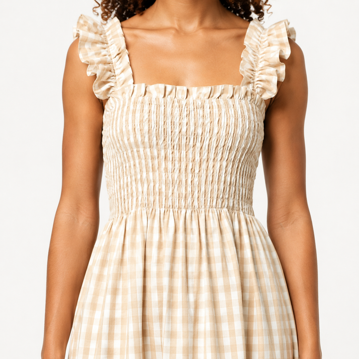 Elegant women's gingham maxi dress with ruffle straps and smocked bodice. Ideal for summer day wear.