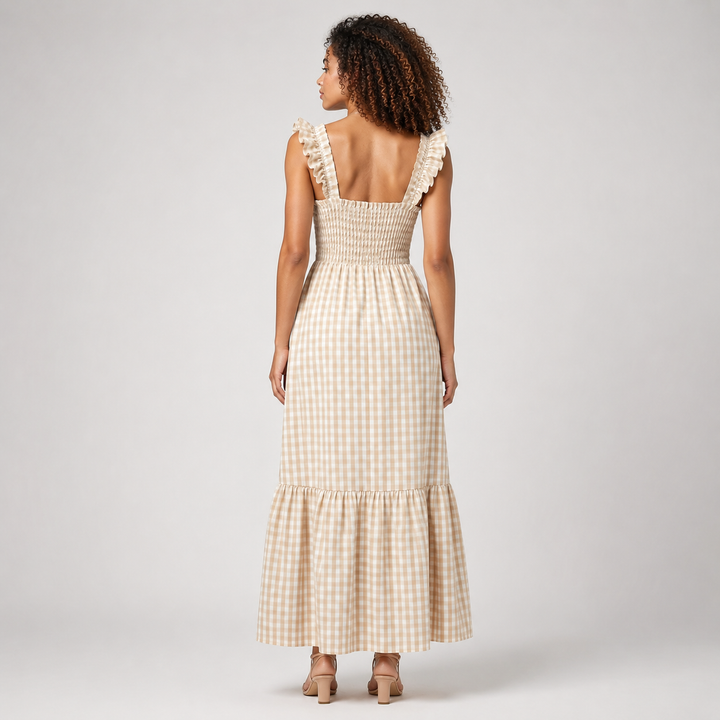 Blue women's breezy gingham maxi dress with stylish ruffle straps and a comfortable smocked bodice.