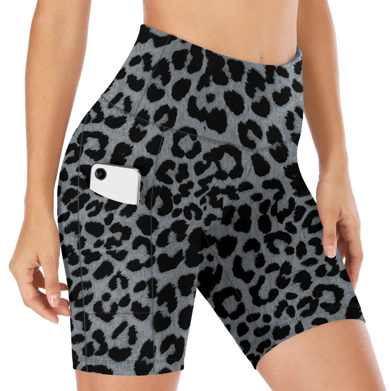 Comfortable women's gym shorts: high-waisted, stretchy leopard print bike shorts with pockets.