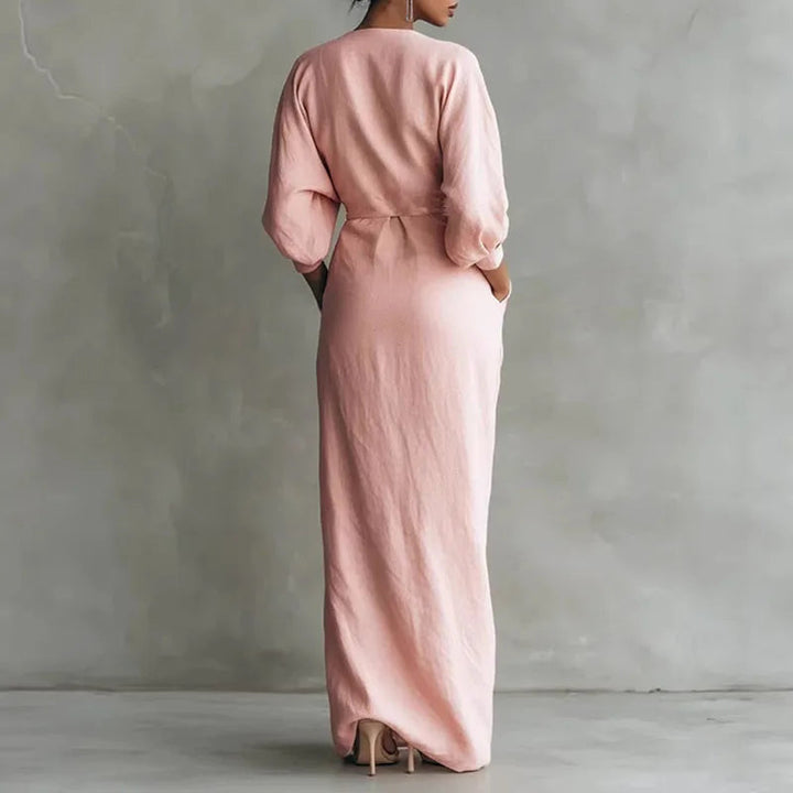Sophisticated women's formal wrap maxi dress. Features a flattering V-neck, elegant side slit, and flowing silhouette.