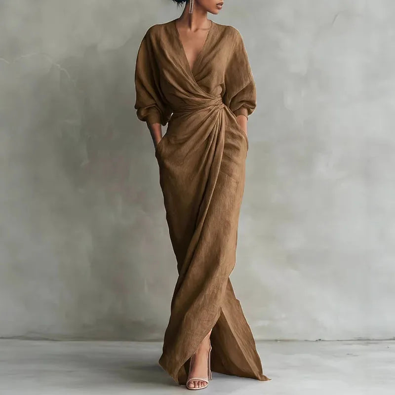 Elegant women's evening maxi wrap dress. Features a stylish V-neck, high side slit, and comfortable flowing fabric.
