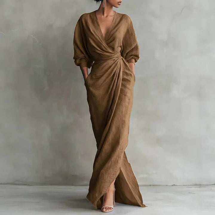 Elegant women's evening maxi wrap dress. Features a stylish V-neck, high side slit, and comfortable flowing fabric.
