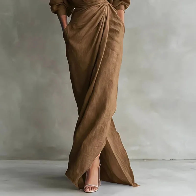 Women's V-neck wrap maxi dress with side slit. Ideal for special occasions, parties, or formal events. Elegant design.