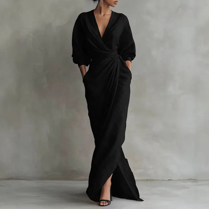 Flowing women's elegant wrap maxi dress with a flattering V-neck, stylish side slit, and cinched tie waist.