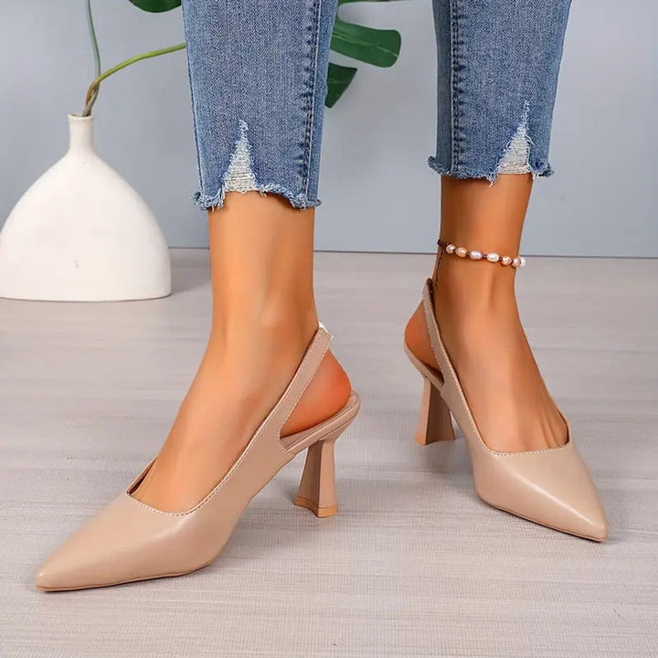 Classic women's pointed toe slingback block heel shoes. Timeless design for office wear or special events.