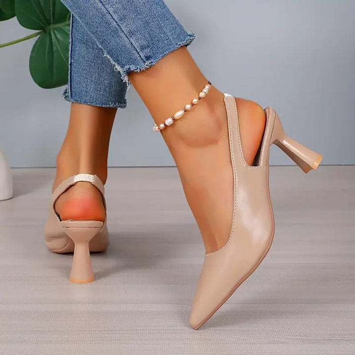 Stylish women's high heels: pointed toe, slingback strap, and a comfortable block heel. Day to night versatility.