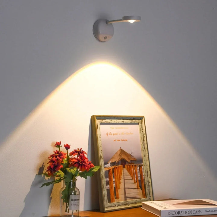Versatile wireless LED motion spotlight, rechargeable, adjustable. Smart lighting for any room or decor style.