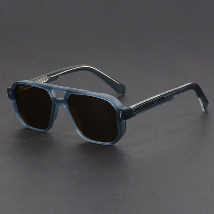 Unisex bold pilot sunglasses with modern square frames and gradient lenses, a stylish fashion accessory.