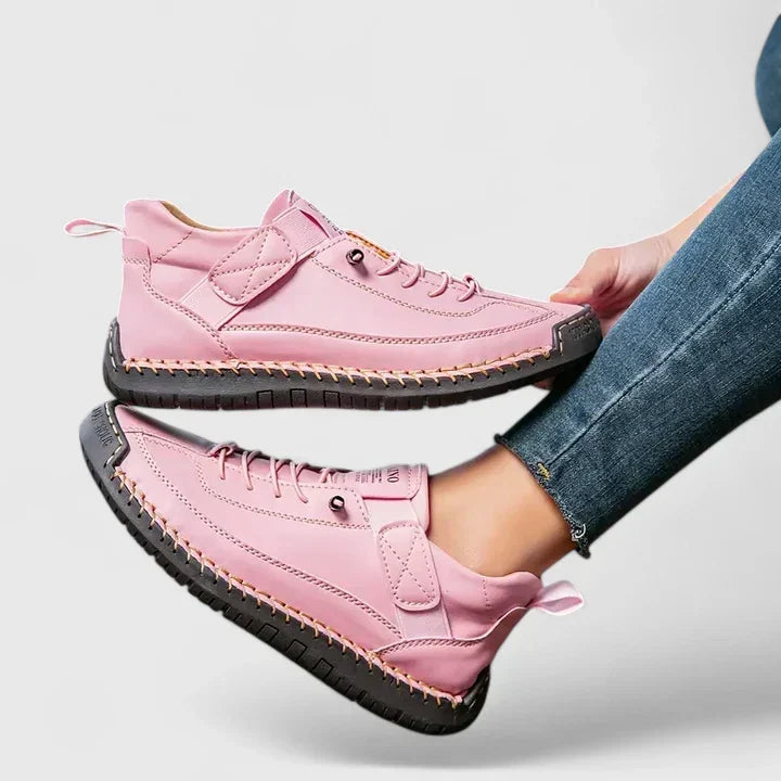 Lace-up women's comfort sneakers, offering supportive fit for everyday walking & casual style.