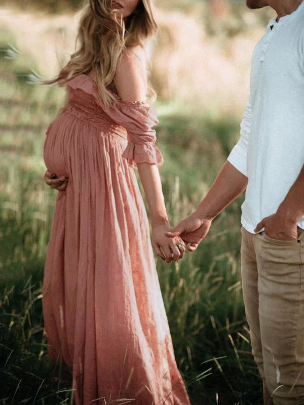 Pinkish red flowy off-shoulder maxi maternity dress, perfect for baby showers & summer events.