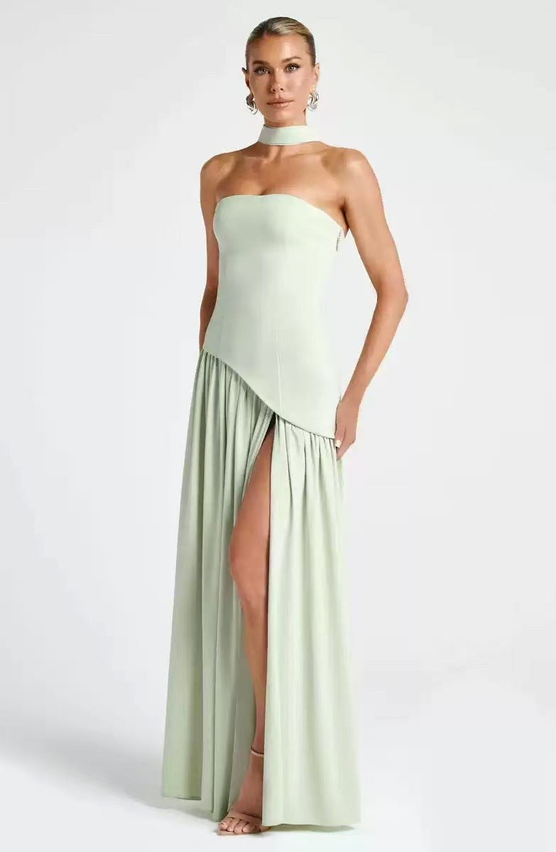 Figure-flattering strapless formal maxi dress with elegant pleats and a fashionable high slit.