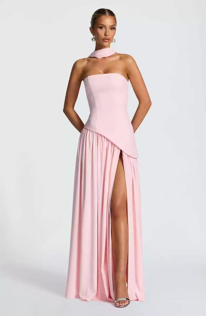 Sophisticated women's evening dress, strapless pleated maxi gown with a graceful high slit.