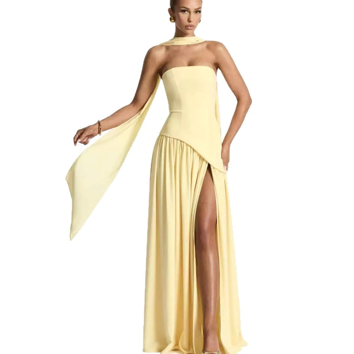 Chic women's pleated strapless gown, a long maxi dress with a sophisticated high slit for parties.