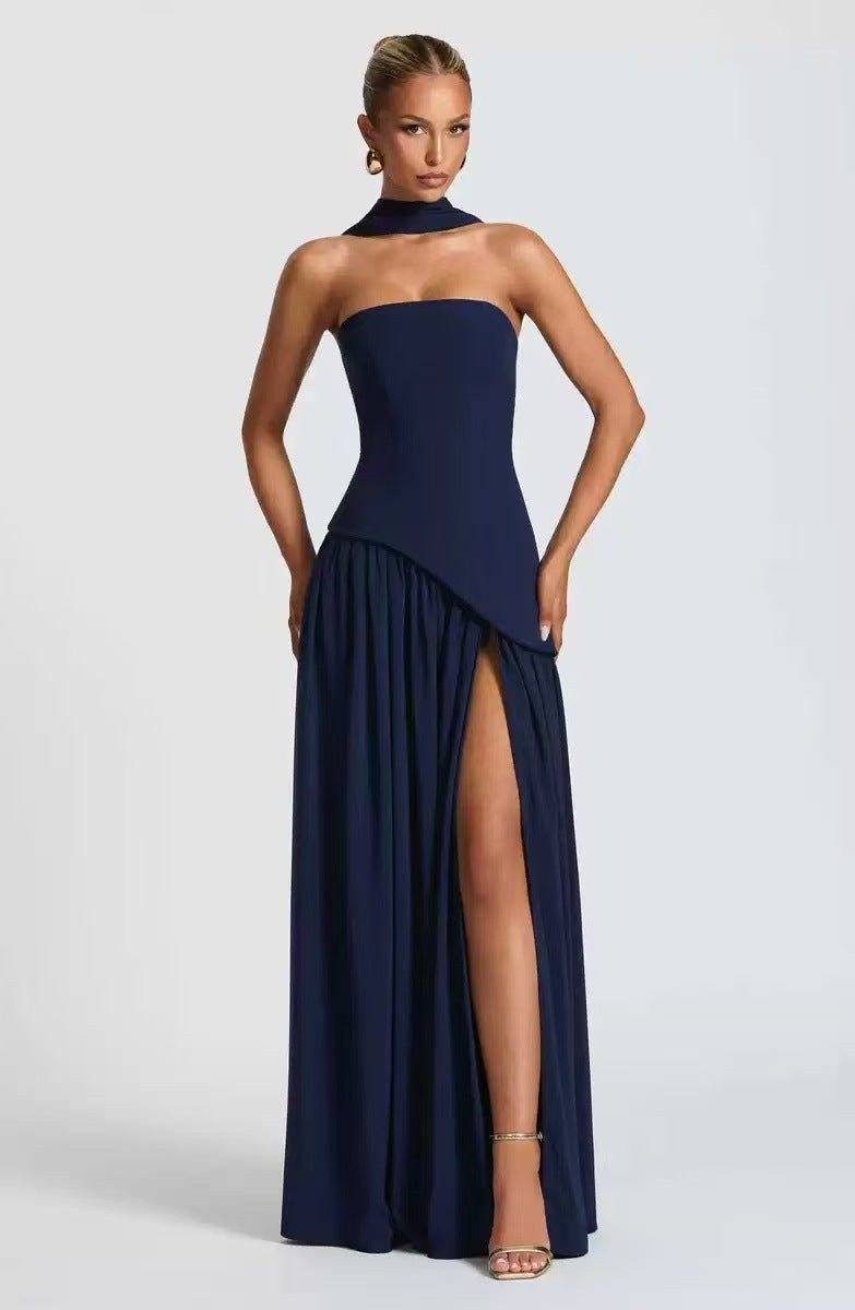 Formal strapless evening gown for women, a long pleated maxi dress with an elegant high leg slit.