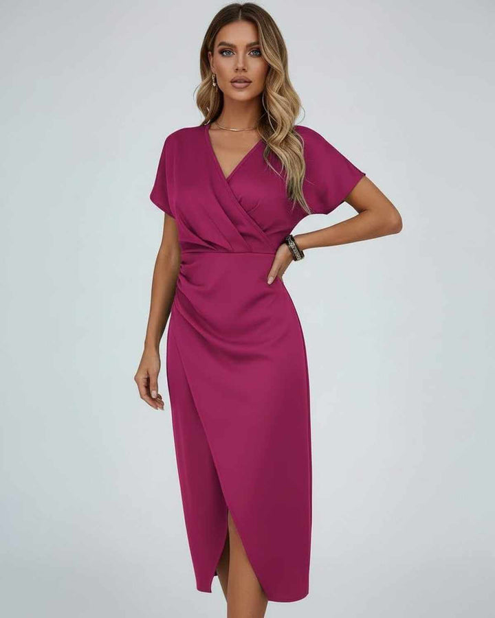 Elegant women's wrap midi cocktail dress with split hem & v-neck. Perfect for parties & special occasions.