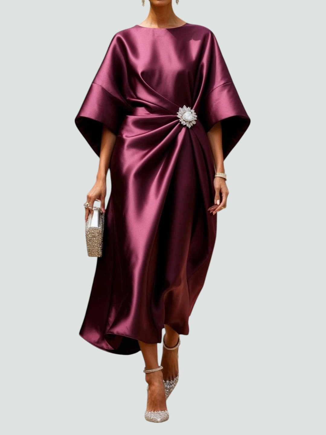 Luxurious draped satin-look cocktail dress with a sophisticated silhouette, ideal for elegant women's wear.