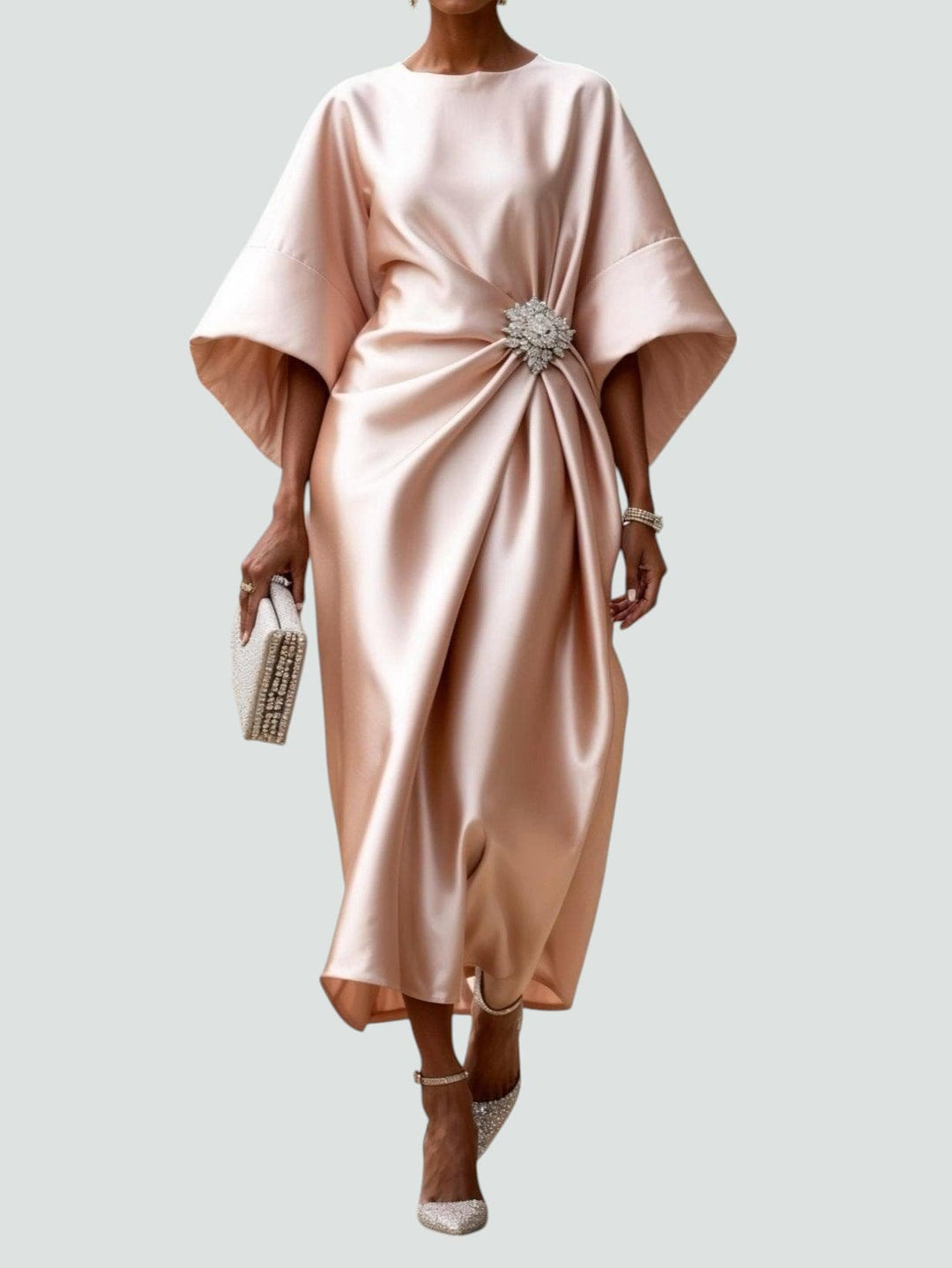 Front view of a graceful women's draped cocktail dress in shimmering satin-look fabric for evening events.