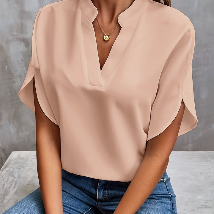 Women's casual chic v-neck blouse, loose-fitting with flowing batwing sleeves for comfort and style.