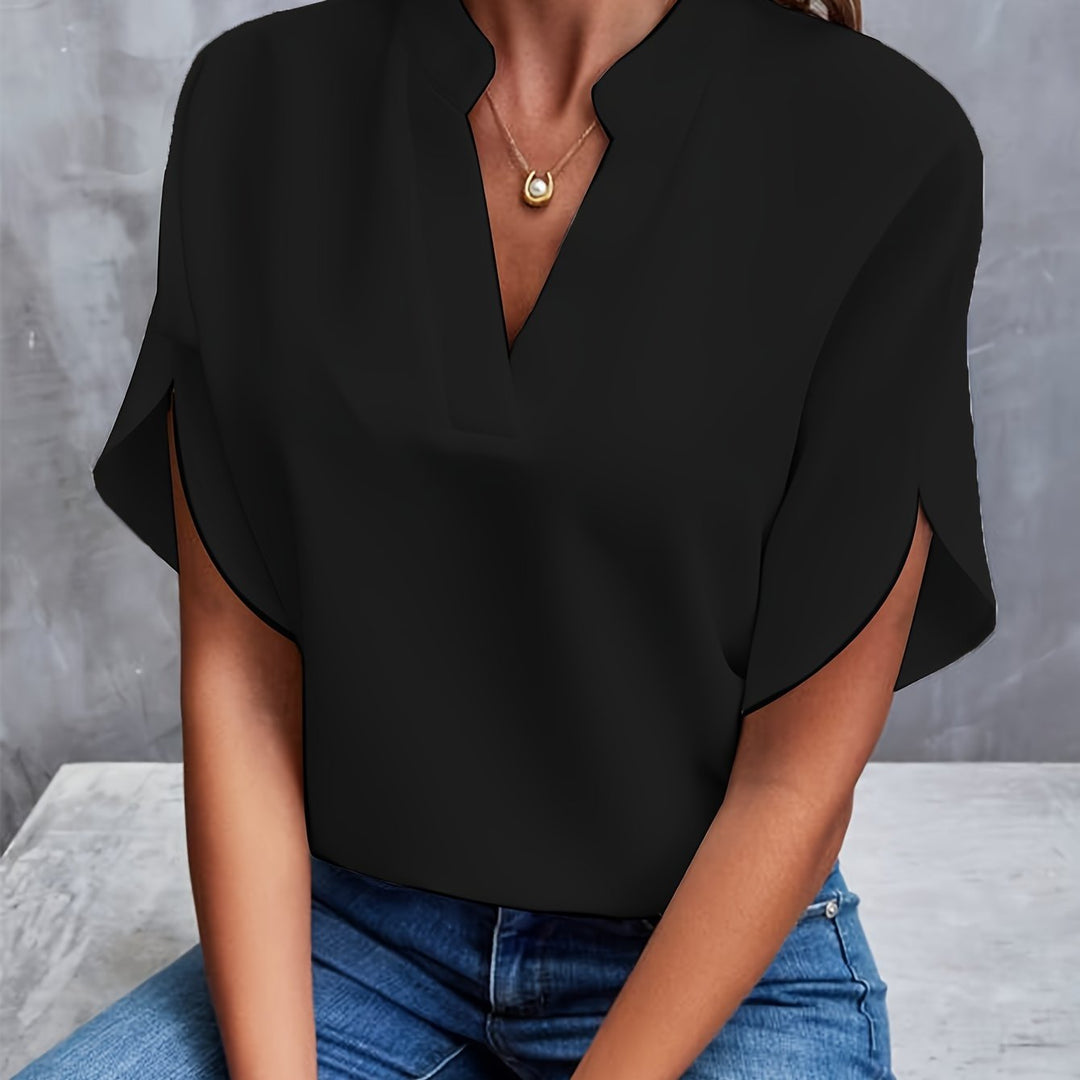 Versatile women's fashion top, v-neck design with stylish batwing sleeves, great for any occasion.