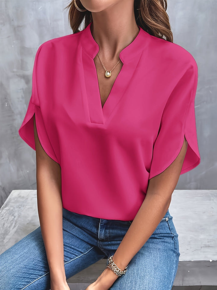 Loose fit women's v-neck blouse, batwing sleeves add a chic touch. Perfect as an elegant everyday top.