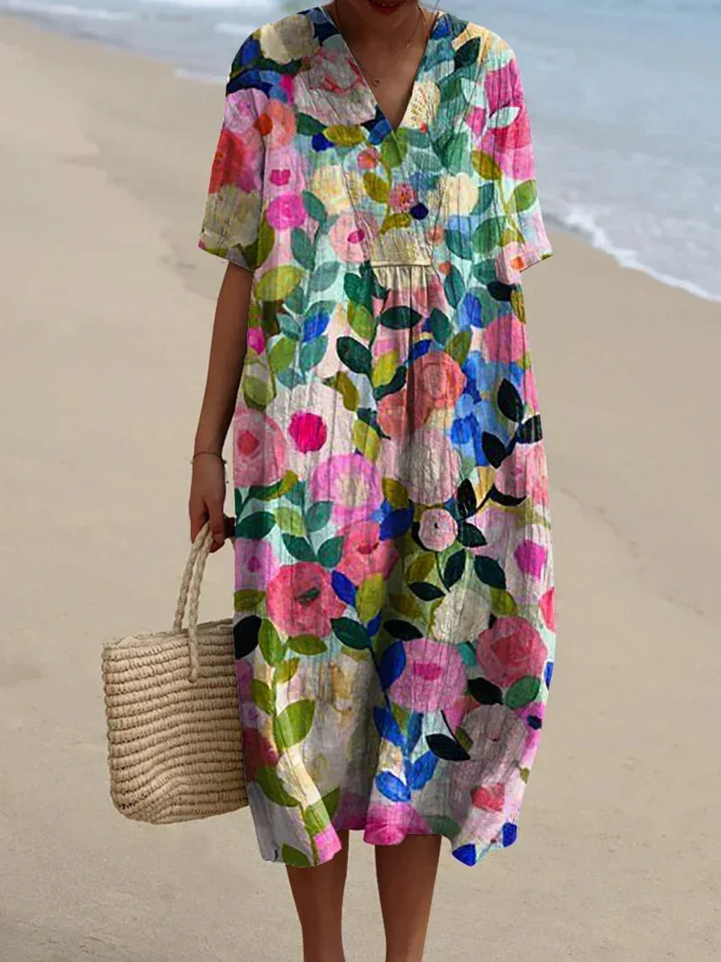 Elegant women's V-neck floral midi dress with flowing silhouette, ideal for summer, garden party, or casual wear.