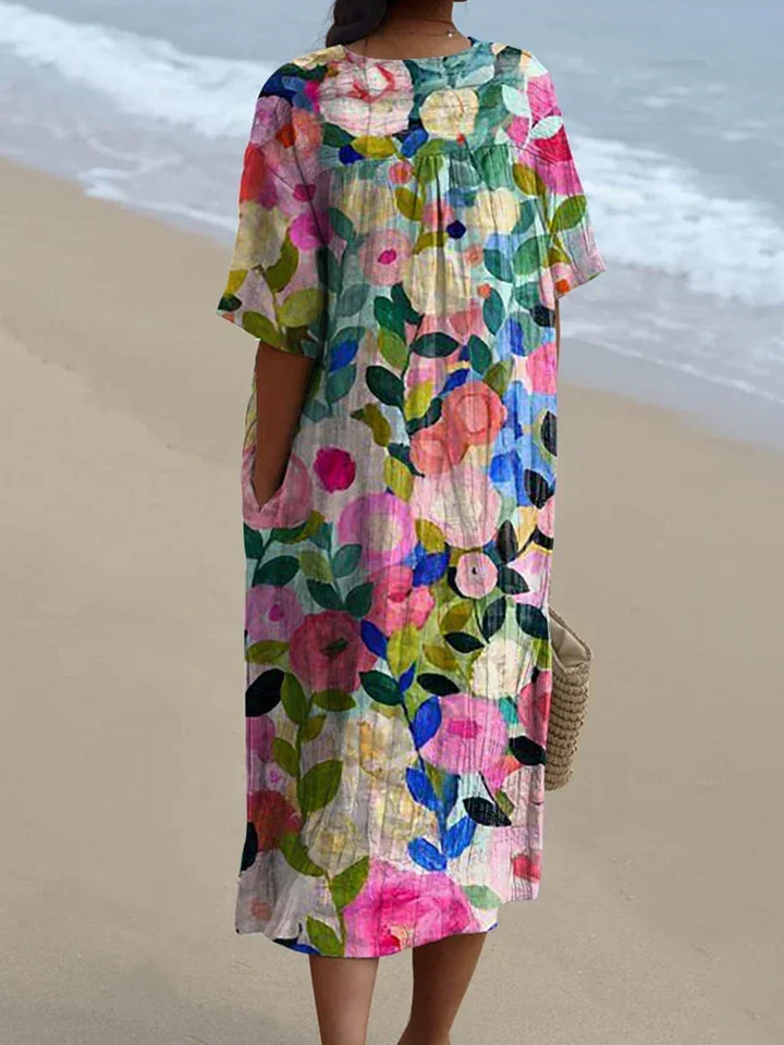 Multicolor artistic floral print V-neck midi dress for women, perfect for summer day wear or a chic beach outing.