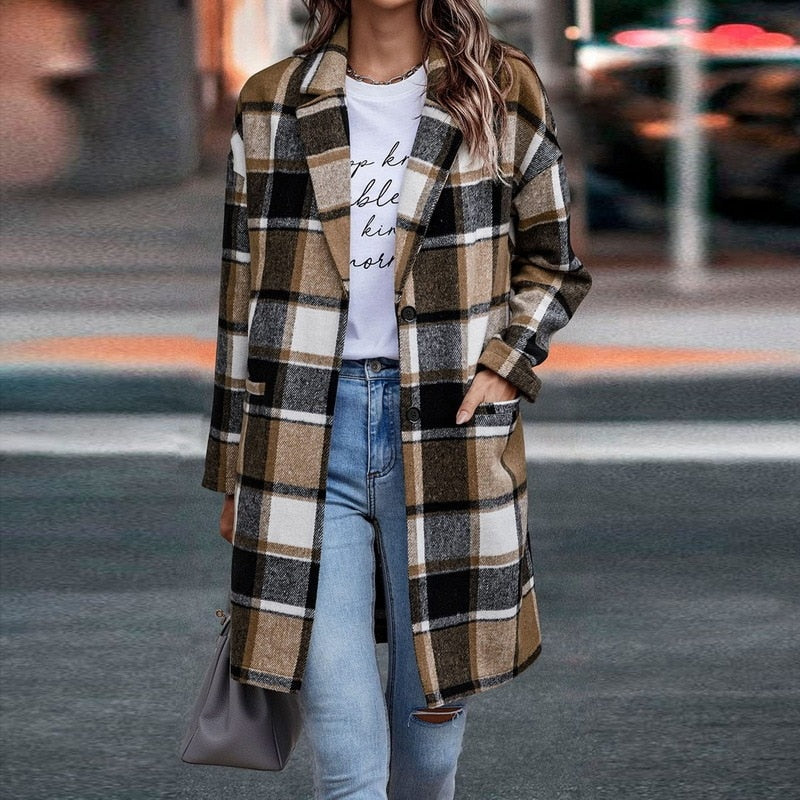 Chic black plaid jacket for women, a trendy and comfortable piece for autumn layering.