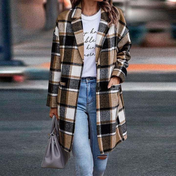Comfortable oversized pink plaid jacket for women, ideal for casual and stylish fall outfits.