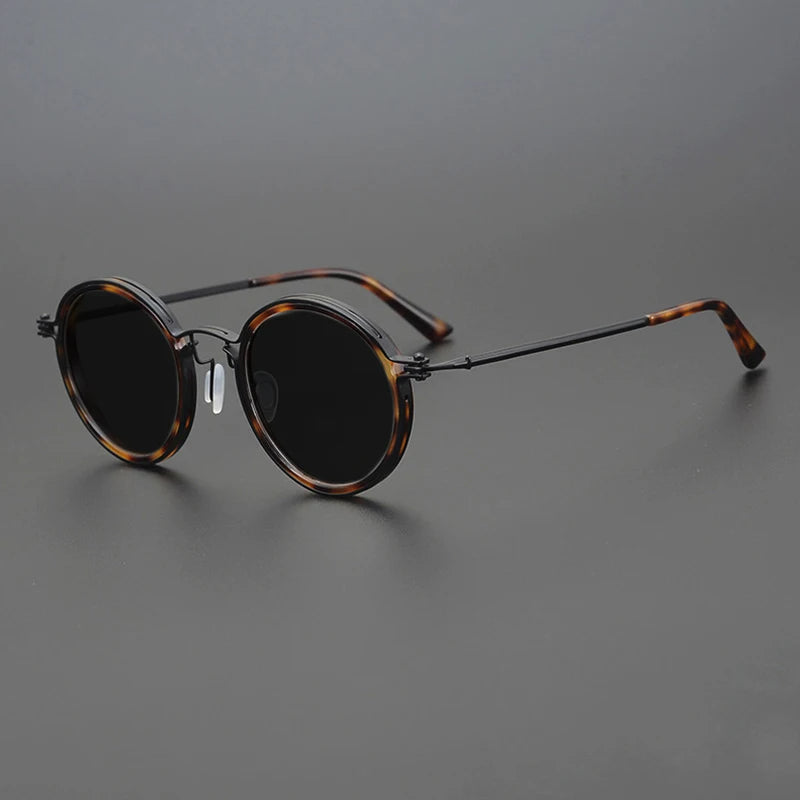 Stylish unisex eyewear with a durable metal frame, polarized lenses providing essential UV400 eye protection.