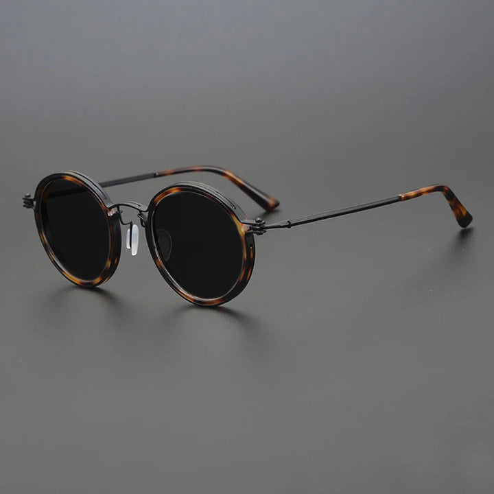 Stylish unisex eyewear with a durable metal frame, polarized lenses providing essential UV400 eye protection.