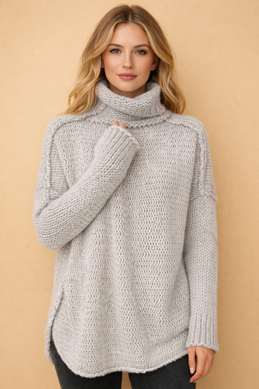 Women's loose fit turtleneck tunic sweater, perfect for cozy and elegant winter fashion.