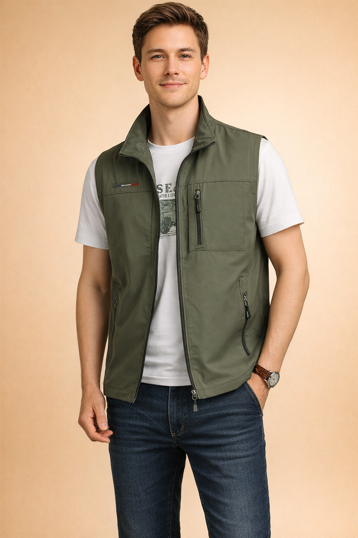Sleek men's lightweight utility vest with secure zippered pockets, designed for comfort during travel and outdoor adventures.